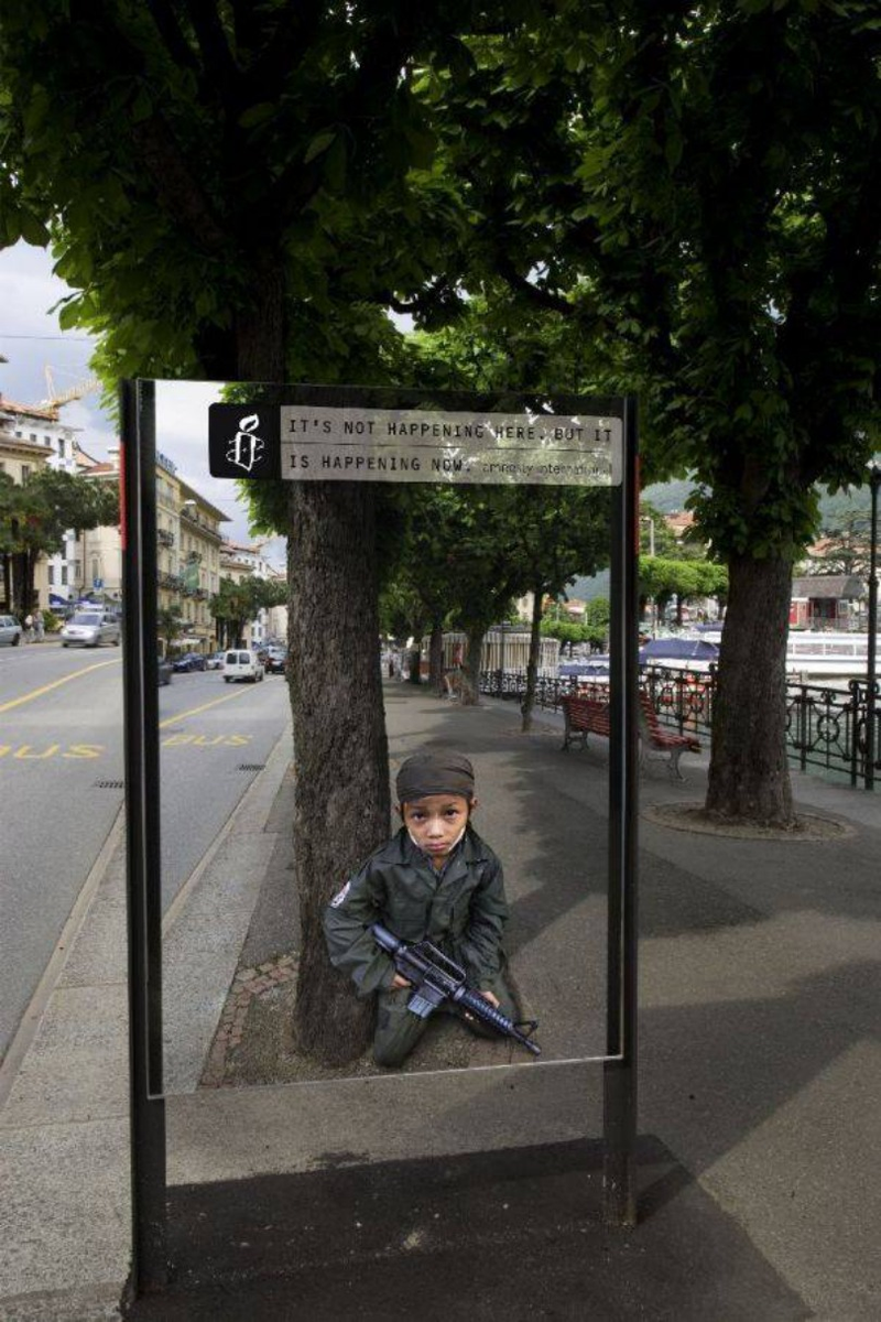 Illustration for article titled Amnesty Ads Create a Portal into Real World Violence